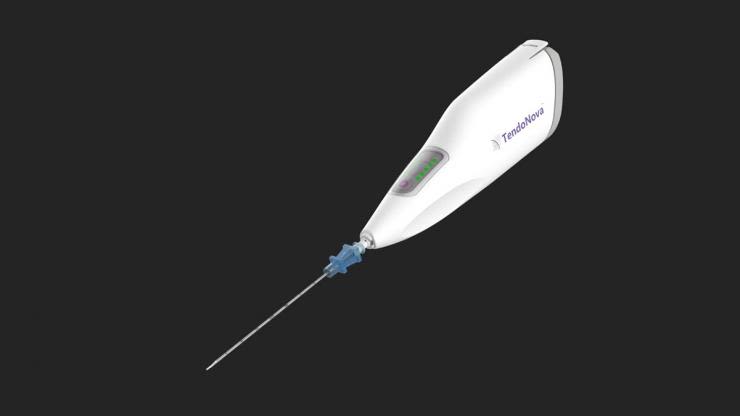 White handheld TendoNova device with a long thin needle attachment, shown on a dark background.